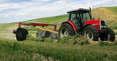 Tractor Harvesting a Field